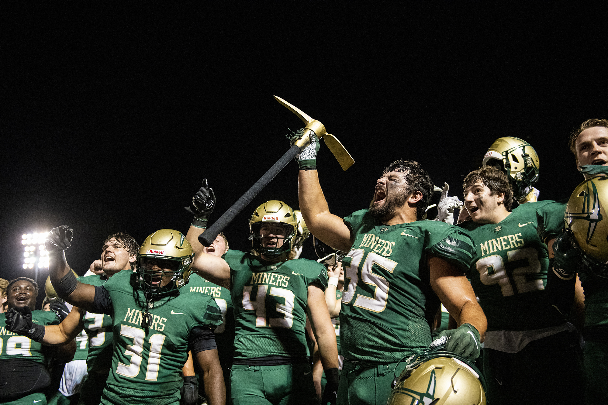 Football players celebrating a win